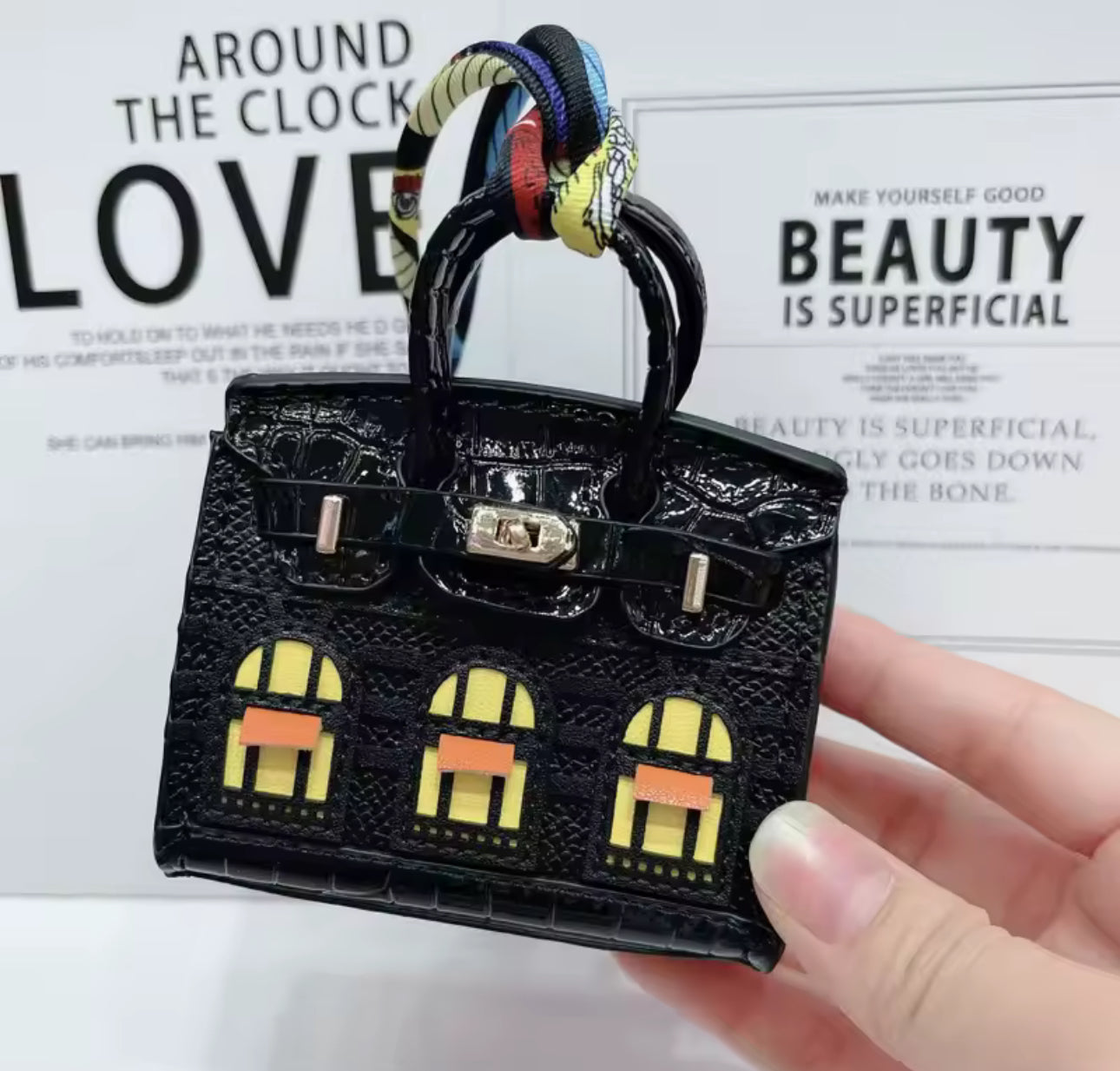 The Iconic Mini Birkin Bag AirPod Case