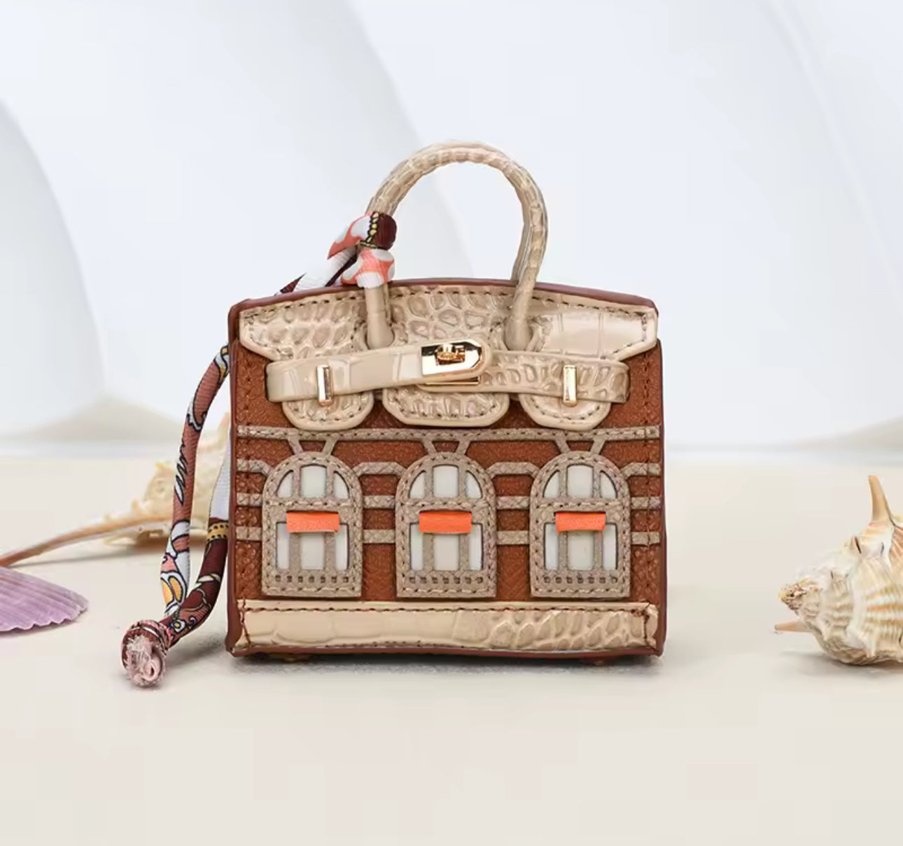 The Iconic Mini Birkin Bag AirPod Case