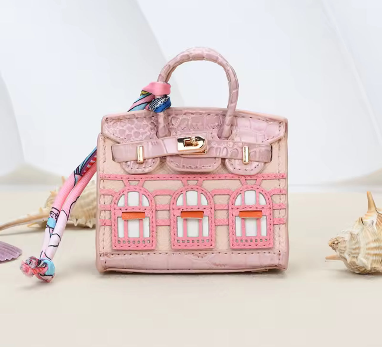 The Iconic Mini Birkin Bag AirPod Case